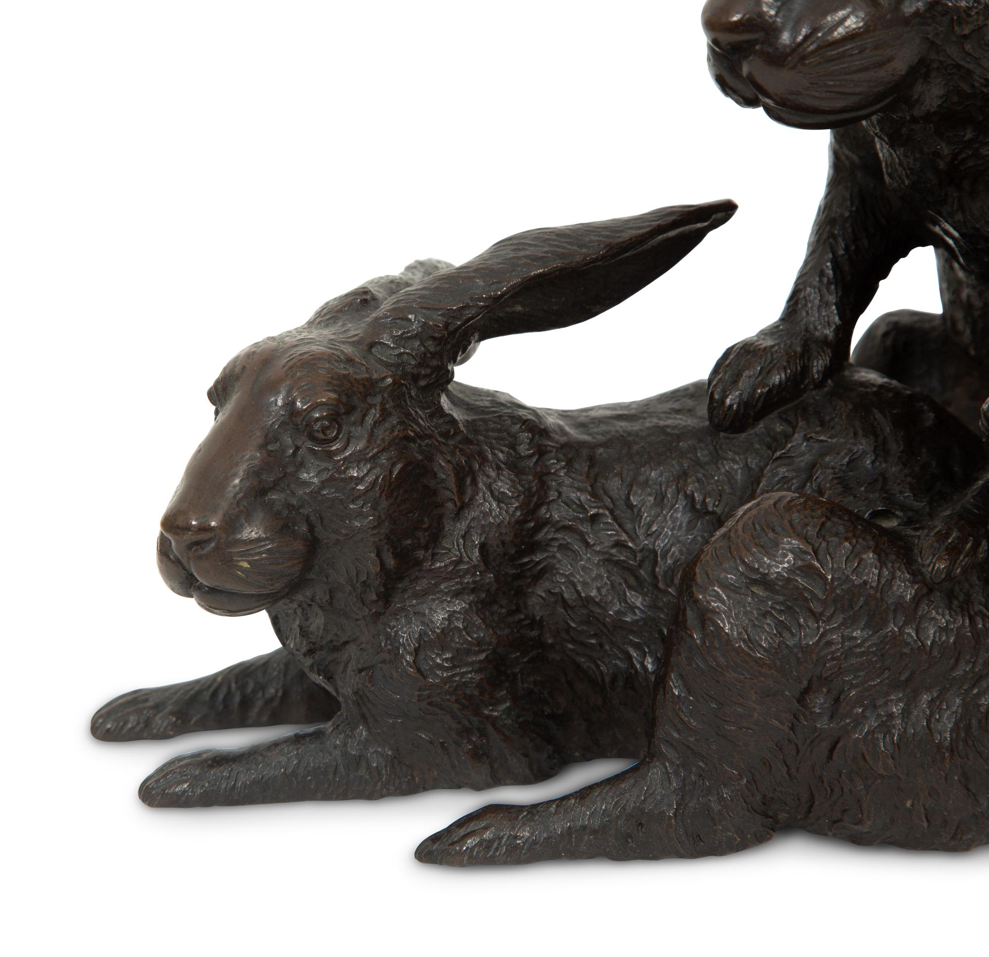 A Japanese Bronze Sculpture of Rabbits