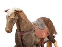 A Child's Horse Hair Upholstered Riding Toy