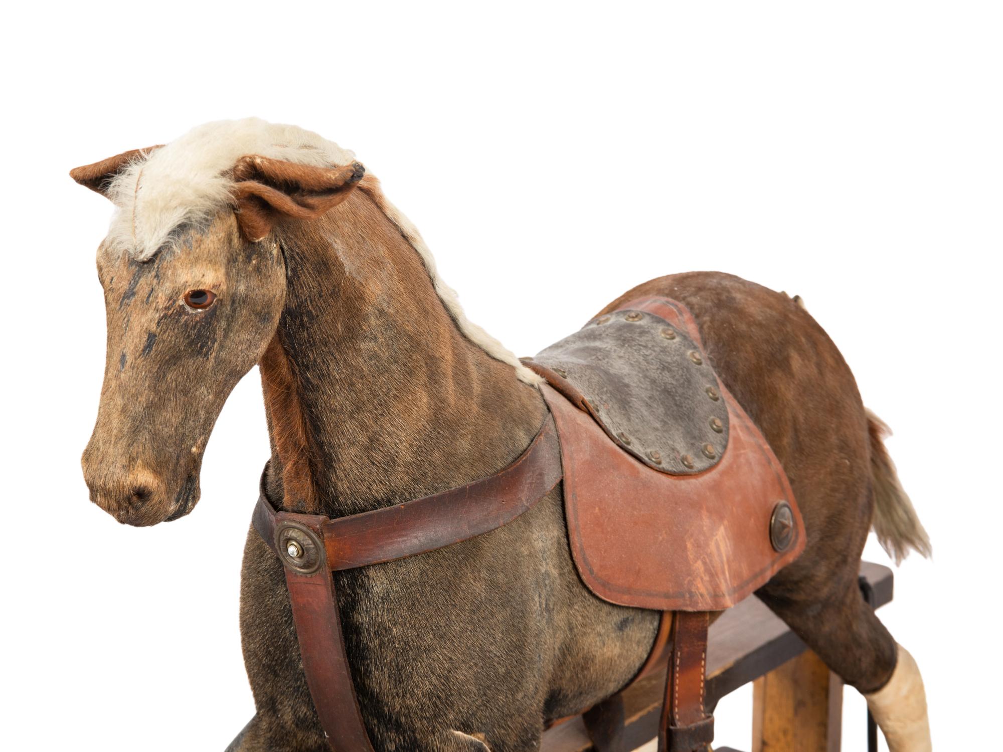 A Child's Horse Hair Upholstered Riding Toy