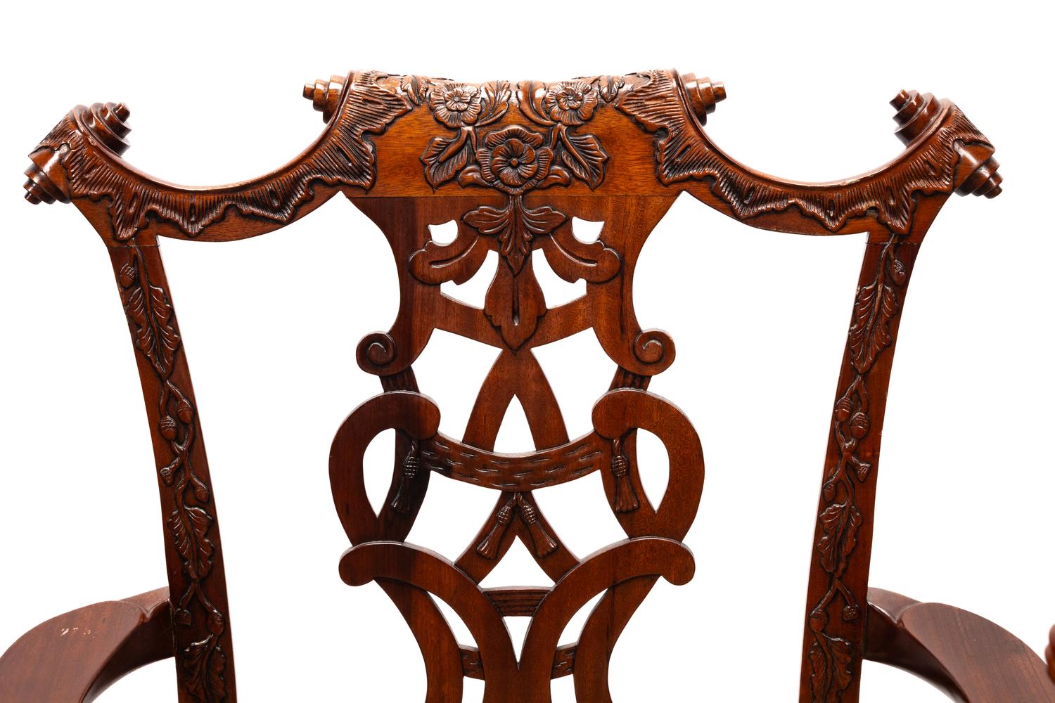 A Set of Sixteen George III Style Carved Walnut Dining Chairs