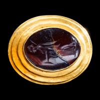 A Greek Gold and Carnelian Finger Ring with the Goddess Artemis