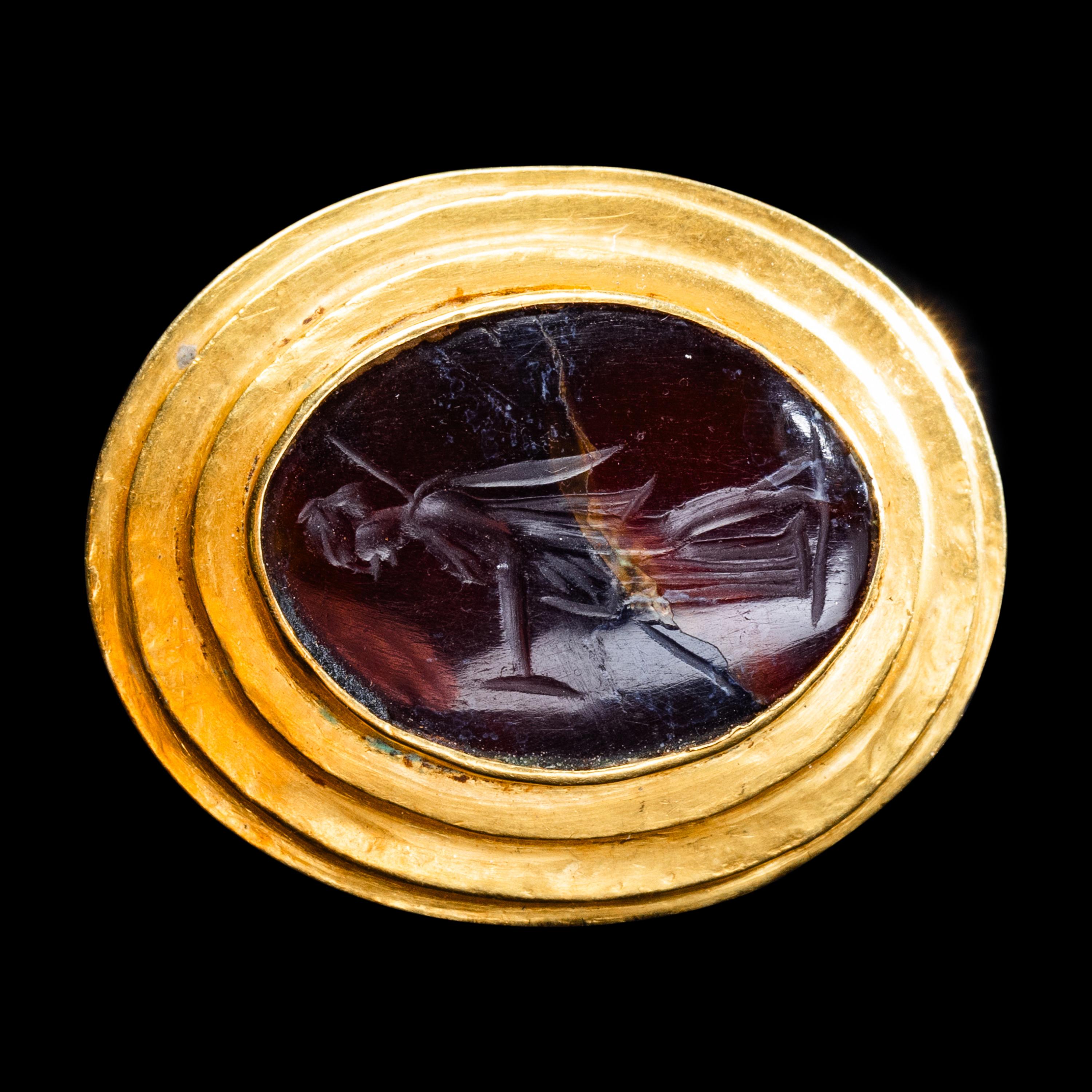 A Greek Gold and Carnelian Finger Ring with the Goddess Artemis
