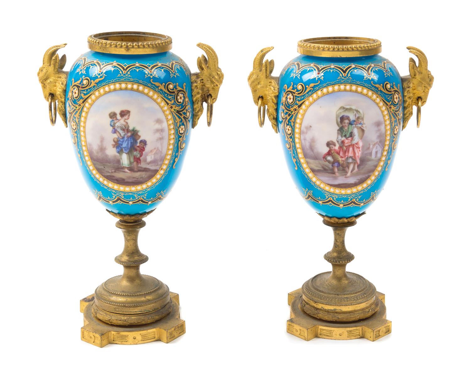 A Pair of Sevres Style Gilt Bronze Mounted Porcelain Urns Height 7 3/4 inches. — 19TH CENTURY