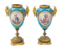 A Pair of Sevres Style Gilt Bronze Mounted Porcelain Urns Height 7 3/4 inches. — 19TH CENTURY