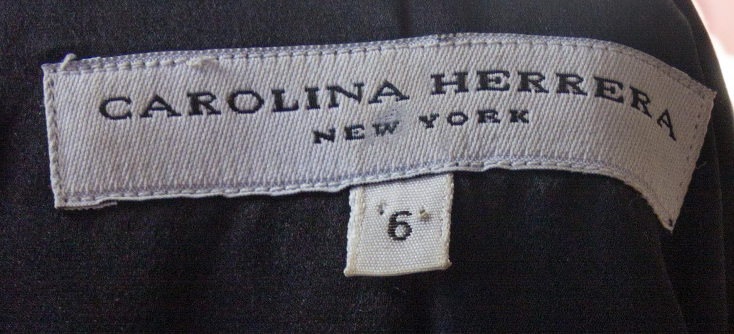 A Carolina Herrera Black Leather Jacket, Size 6.