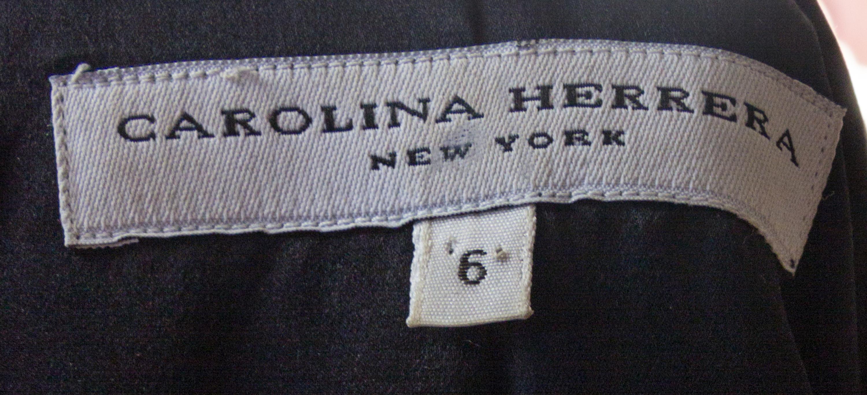 A Carolina Herrera Black Leather Jacket, Size 6.