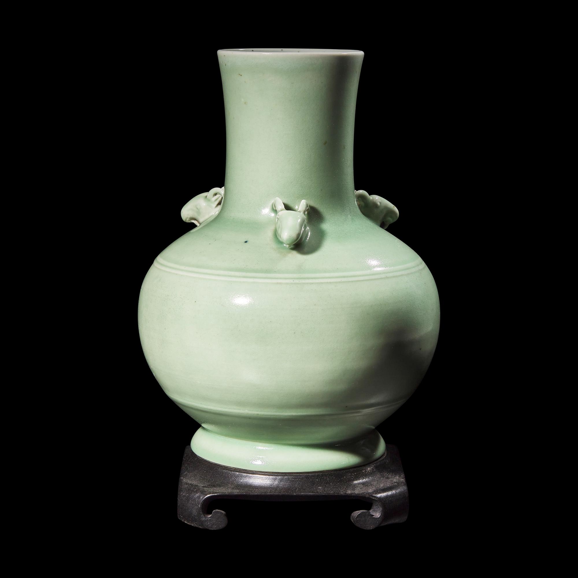 A Chinese Celadon Glazed Porcelain 'Three Rams' Vase, Late Qing Dynasty 清晚期 粉青釉三羊弦紋尊