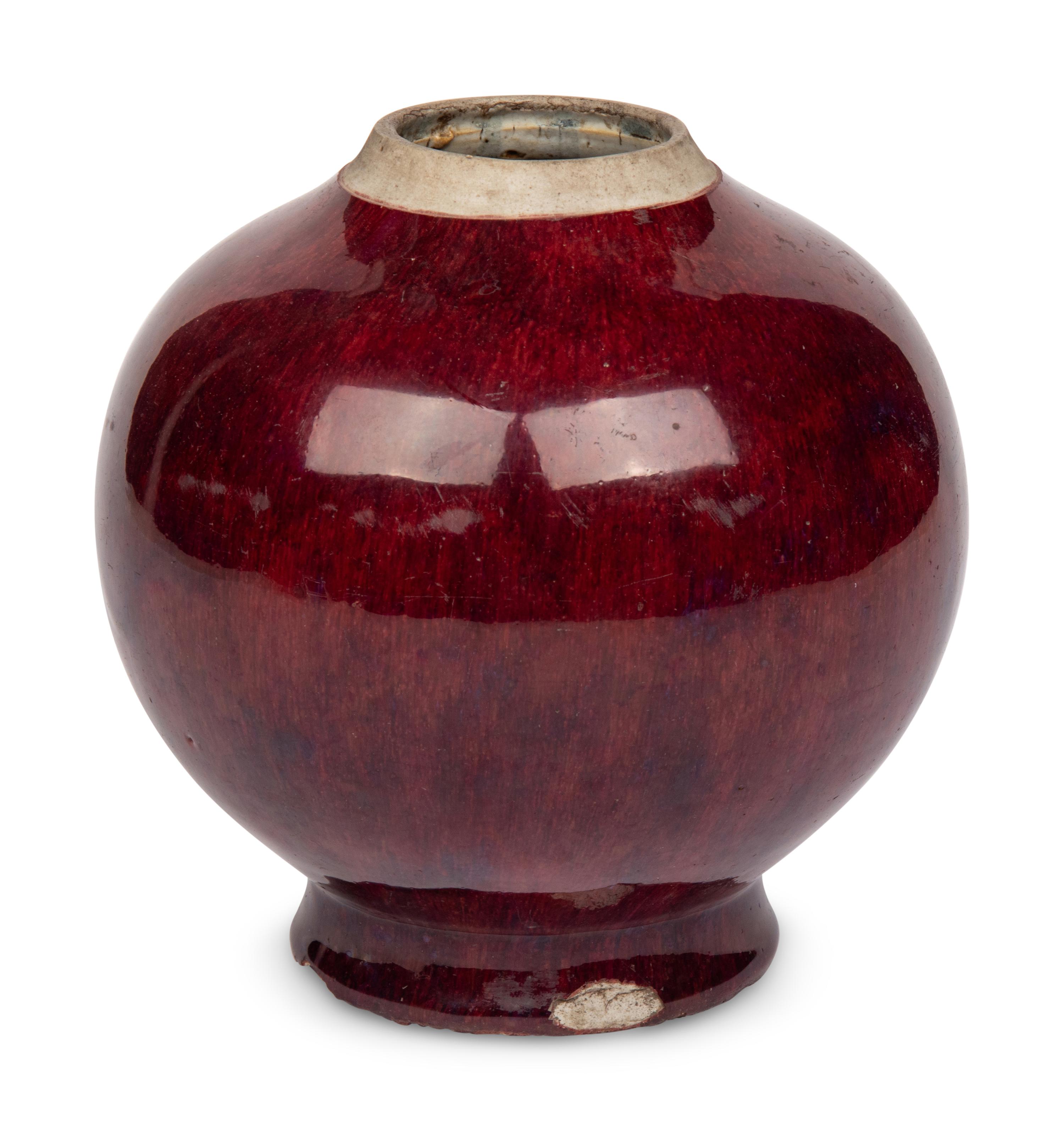 A Chinese Sang de Boeuf Glazed Porcelain Jar