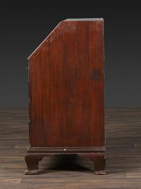 A Chippendale Figured and Shell-Carved Mahogany Slant Front Desk