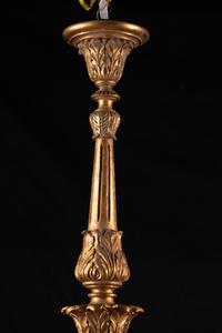 An Italian Rococo Style Giltwood Sixteen-Light Chandelier