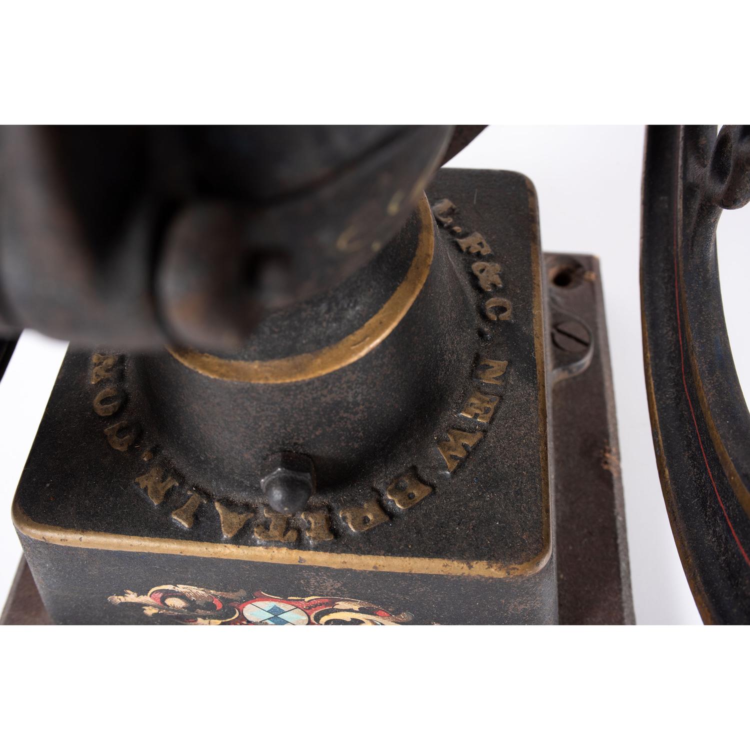A Landers, Frary & Clark Painted Cast Iron Coffee Mill