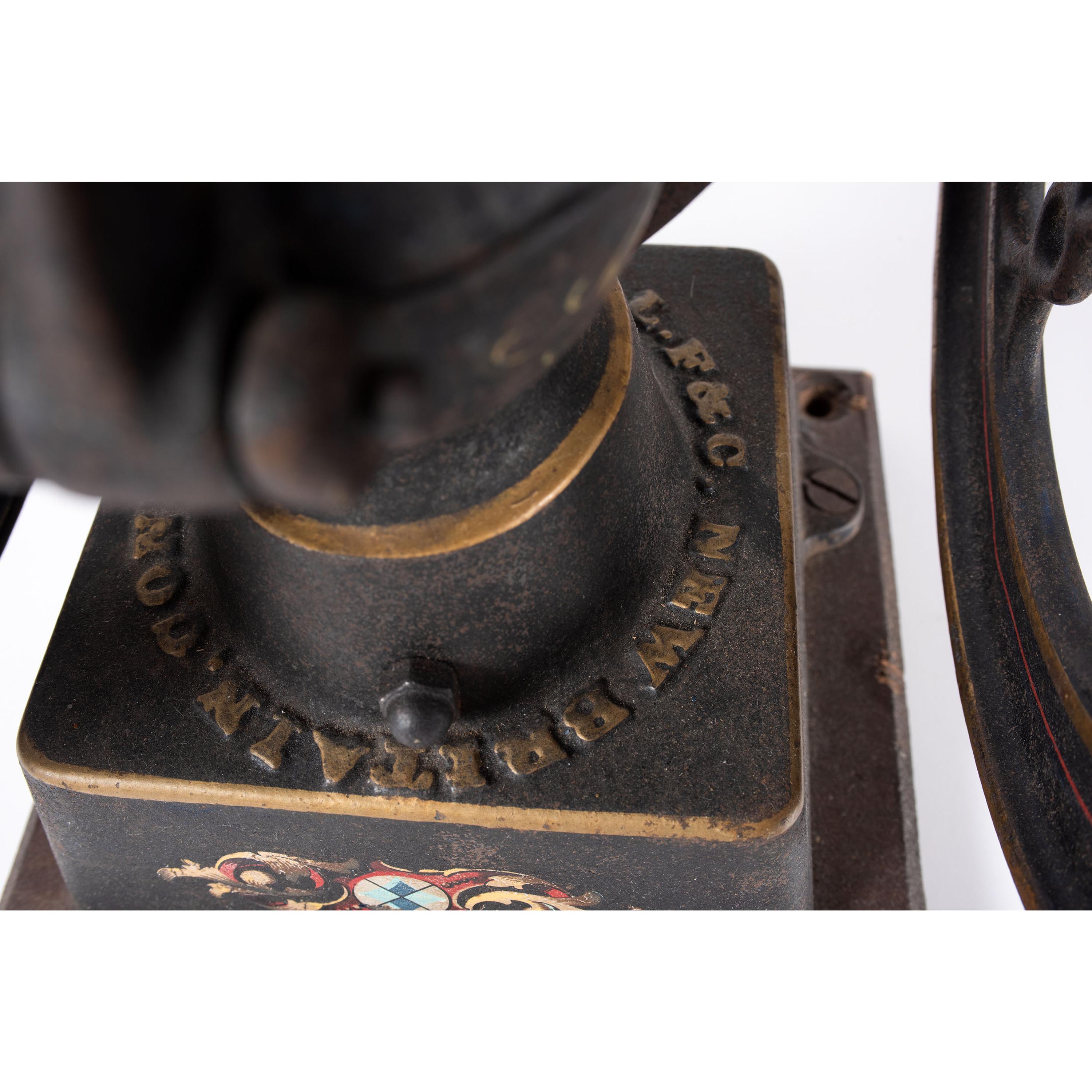 A Landers, Frary & Clark Painted Cast Iron Coffee Mill