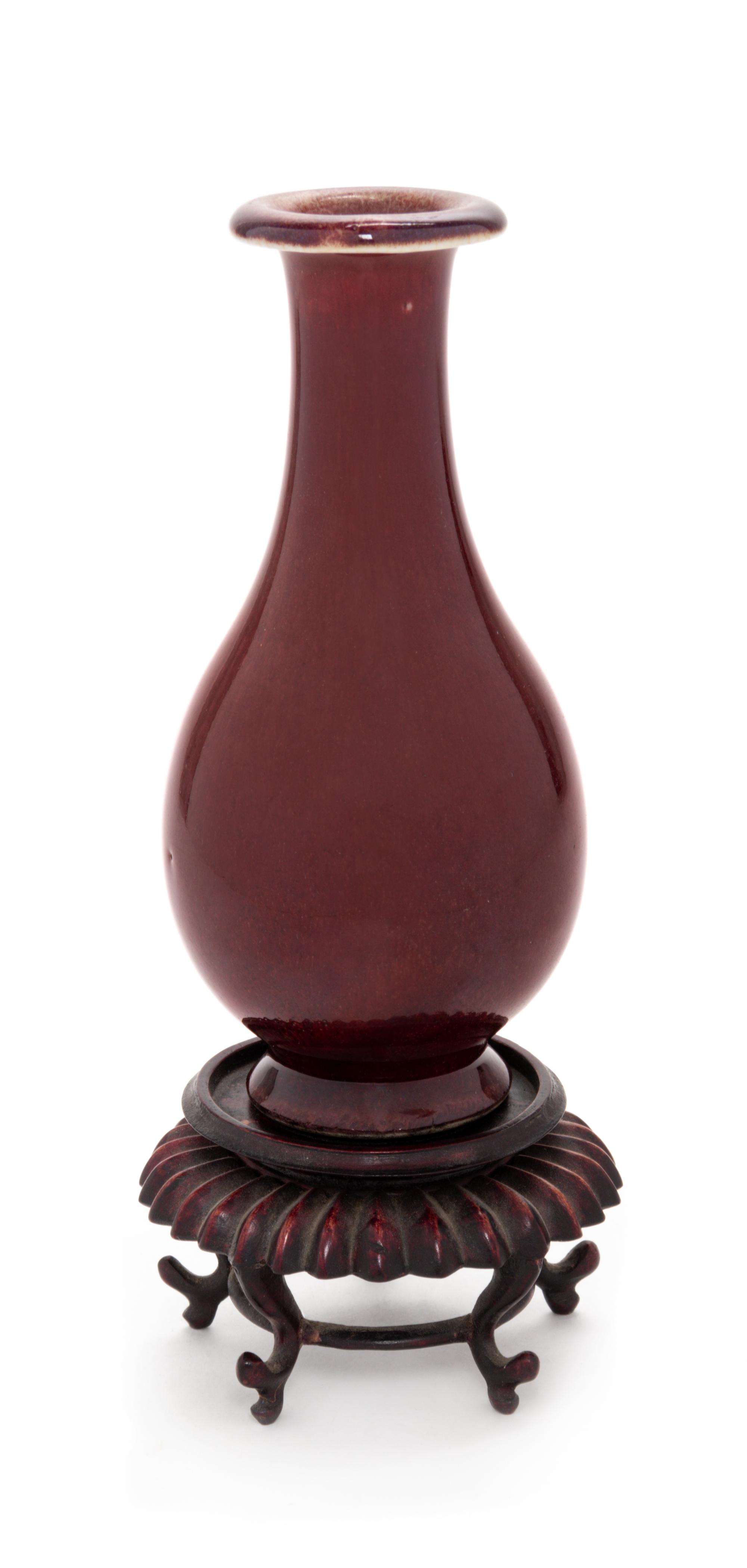 A Chinese Sang-de-Boeuf Glazed Porcelain Vase Height 5 3/4 inches. — 19TH CENTURY