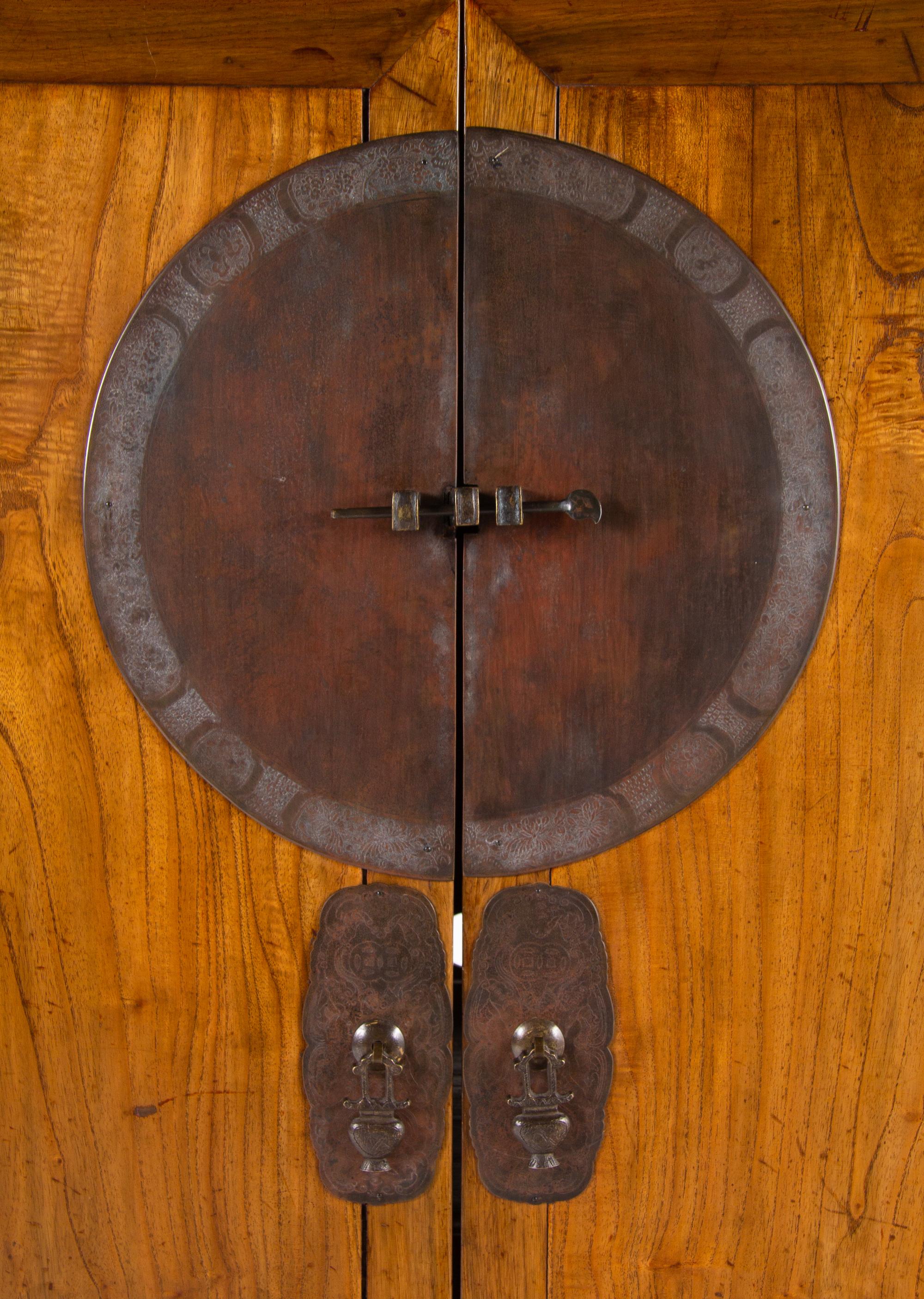 A Chinese Elmwood Cabinet