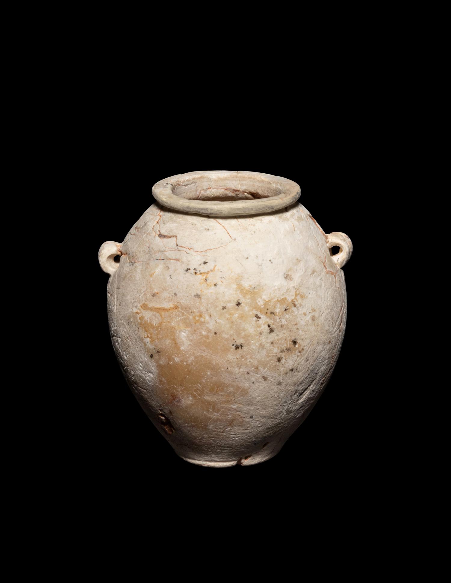 An Egyptian Miniature Limestone Lug Handled Jar