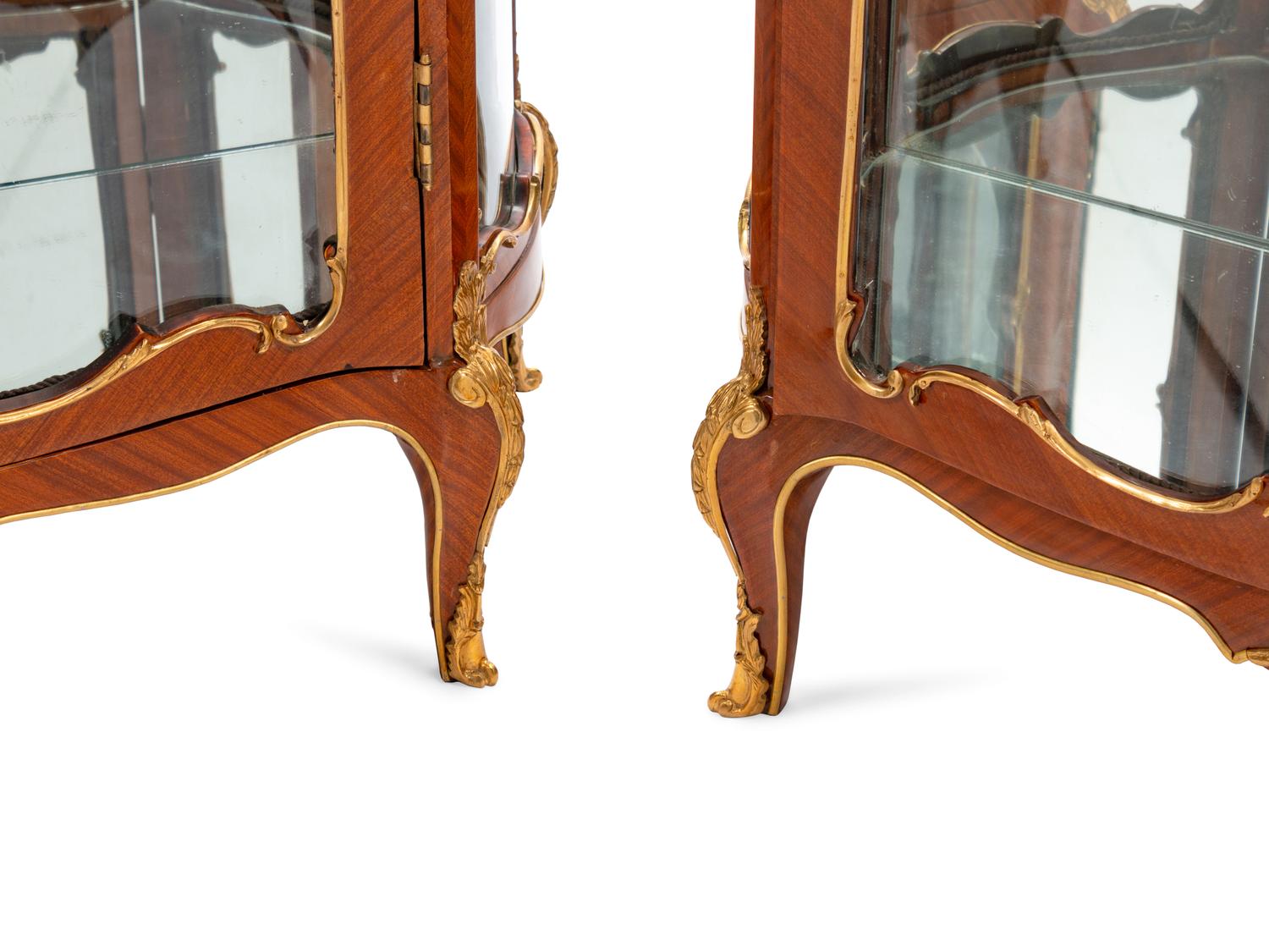 A Pair of Louis XV Style Gilt Metal Mounted Marble-Top Vitrine Cabinets