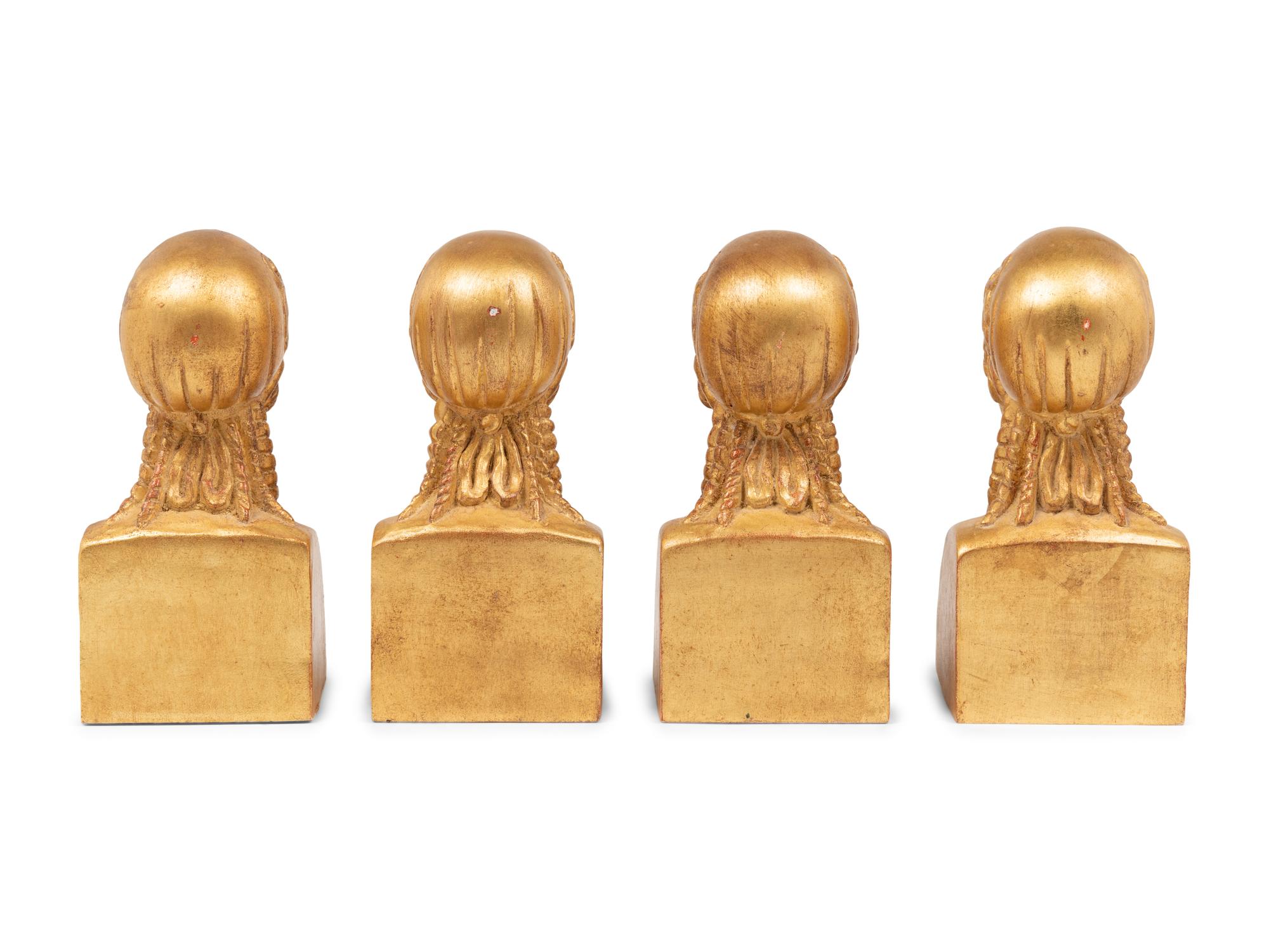 A Set of Four Giltwood Busts of Greek Ladies