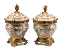 A Pair of French Gilt Bronze Mounted Sèvres Porcelain Potpourri Jars and Covers