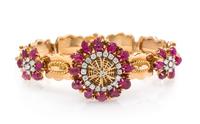 A Retro 18 Karat Rose Gold, Ruby, and Diamond Surprise Wristwatch, Gubelin, 28.10 dwts.