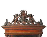 An Italian carved and parcel-gilt alabaster figure of the Madonna of Trapani, Sicily, 18th century, displayed in carved walnut and glass reliquary box, likely 19th century