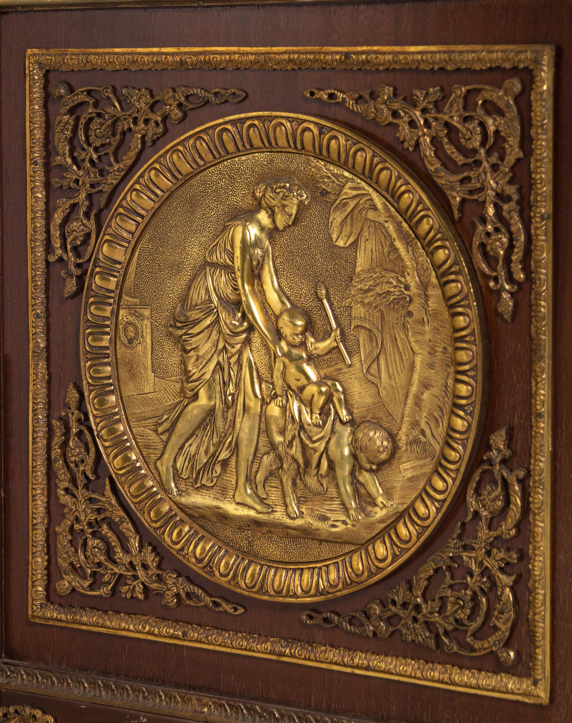 A Louis XVI Style Gilt Bronze Mounted Mahogany Marble-Top Commode à Vantaux After the Model by Guillaume Benneman