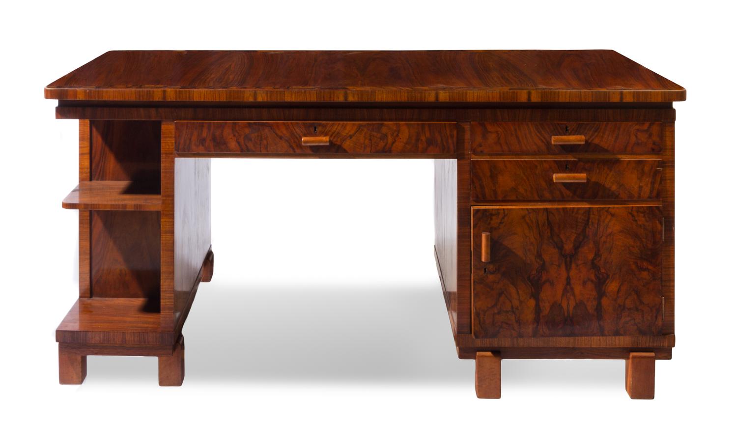An Art Deco Burlwood Pedestal Desk Height 30 5/8 x width 63 1/8 x depth 31 1/2 inches.