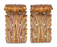 A Pair of Continental Painted and Giltwood Brackets