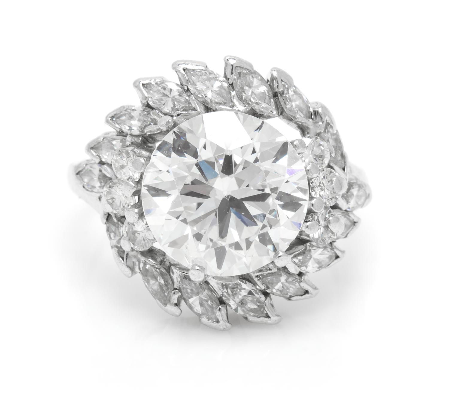 A Platinum and Round Brilliant Cut Diamond Ring, 5.50 dwts.