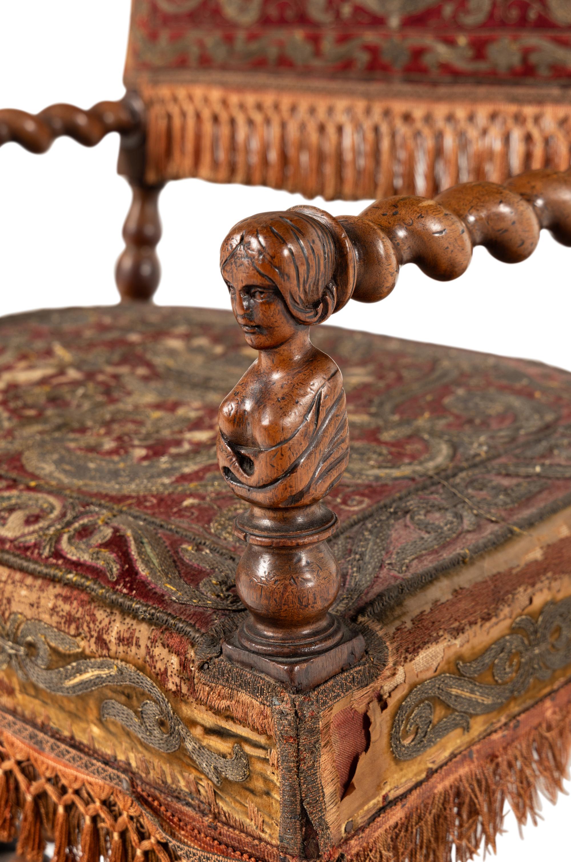 A Set of Four Baroque Revival Walnut Armchairs