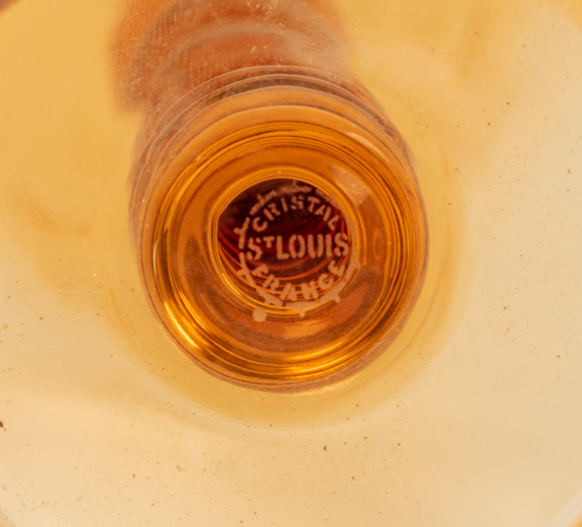 A Set of Fifteen St. Louis Amber Glass Stems