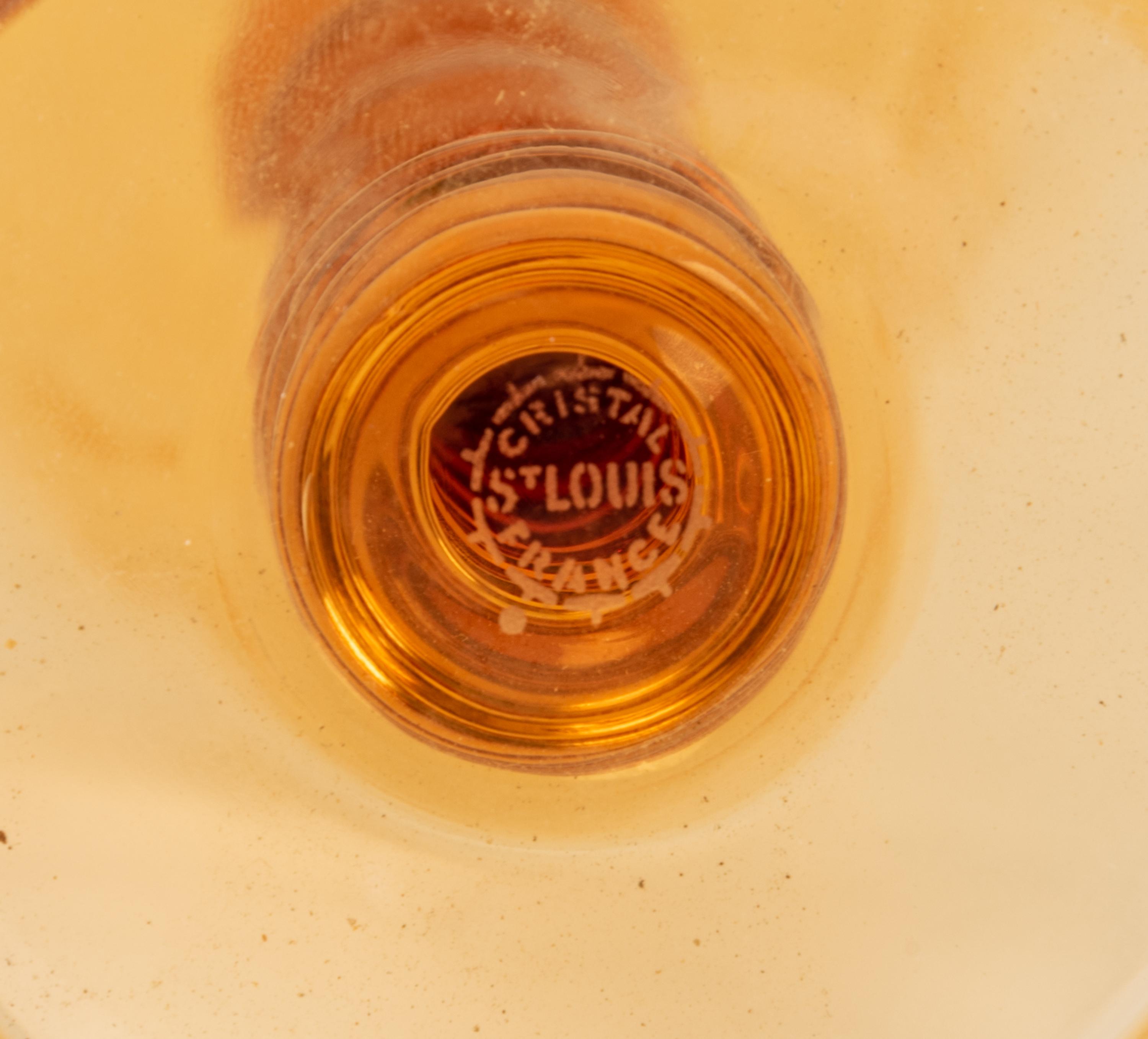 A Set of Fifteen St. Louis Amber Glass Stems
