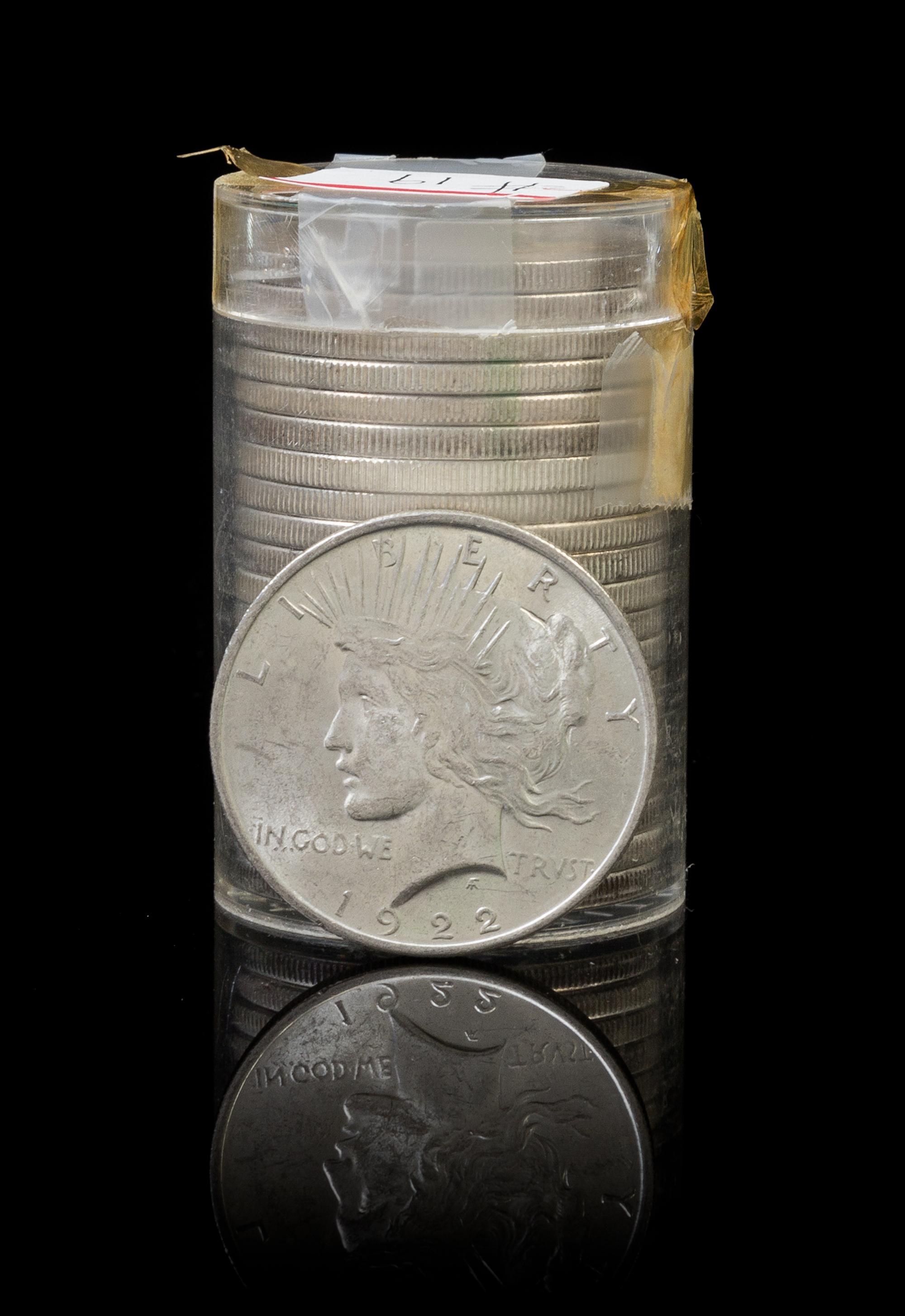 A Group of Twenty-One United States 1922 Peace Silver Dollars