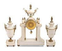 A French Gilt Metal Mounted Marble Three-Piece Clock Garniture