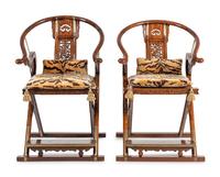 A Pair of Chinese Brass Mounted Hardwood Horseshoe-Back Campaign Chairs