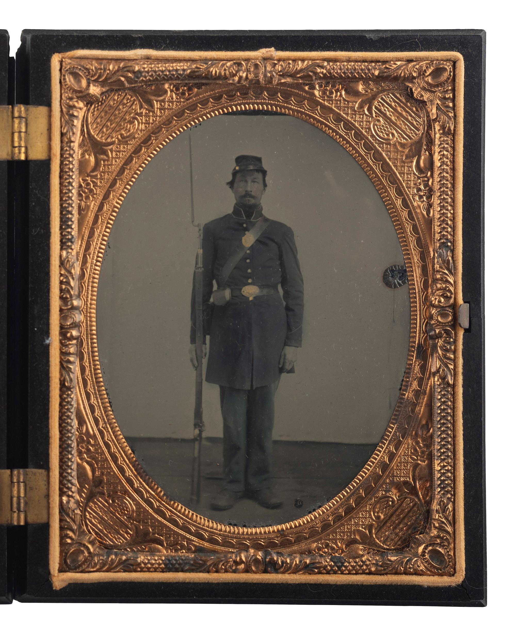[CIVIL WAR]. Quarter plate ruby ambrotype of soldier standing with bayonet.