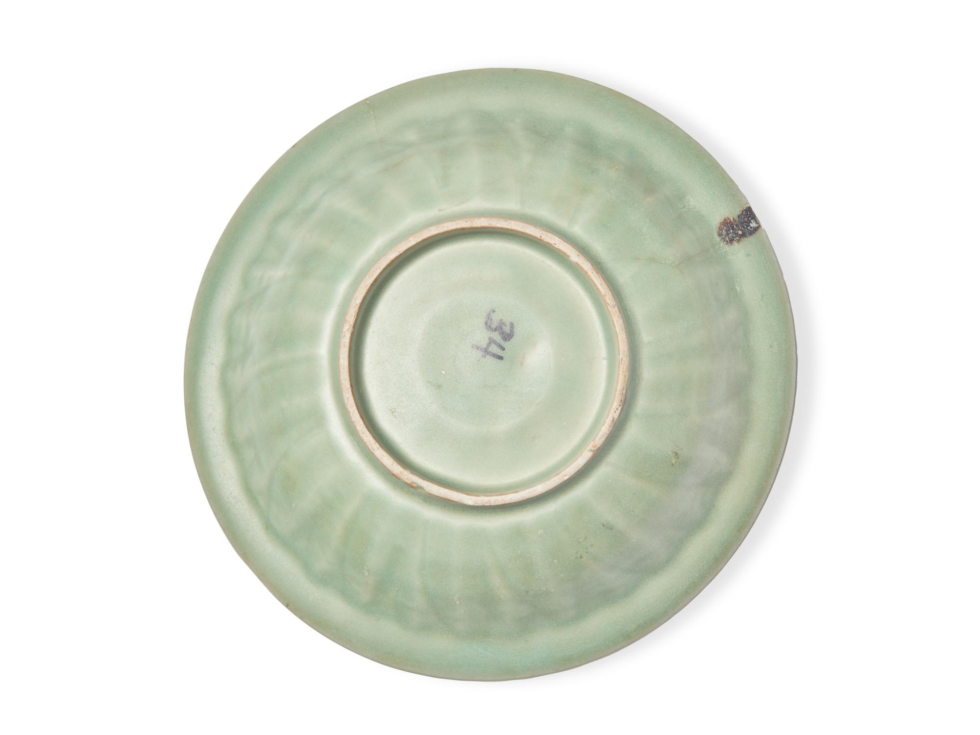 A Chinese Longquan Celadon Glazed Porcelain 'Double Fish' Dish, Ming Dynasty 明 龍泉窯青釉雙魚盤
