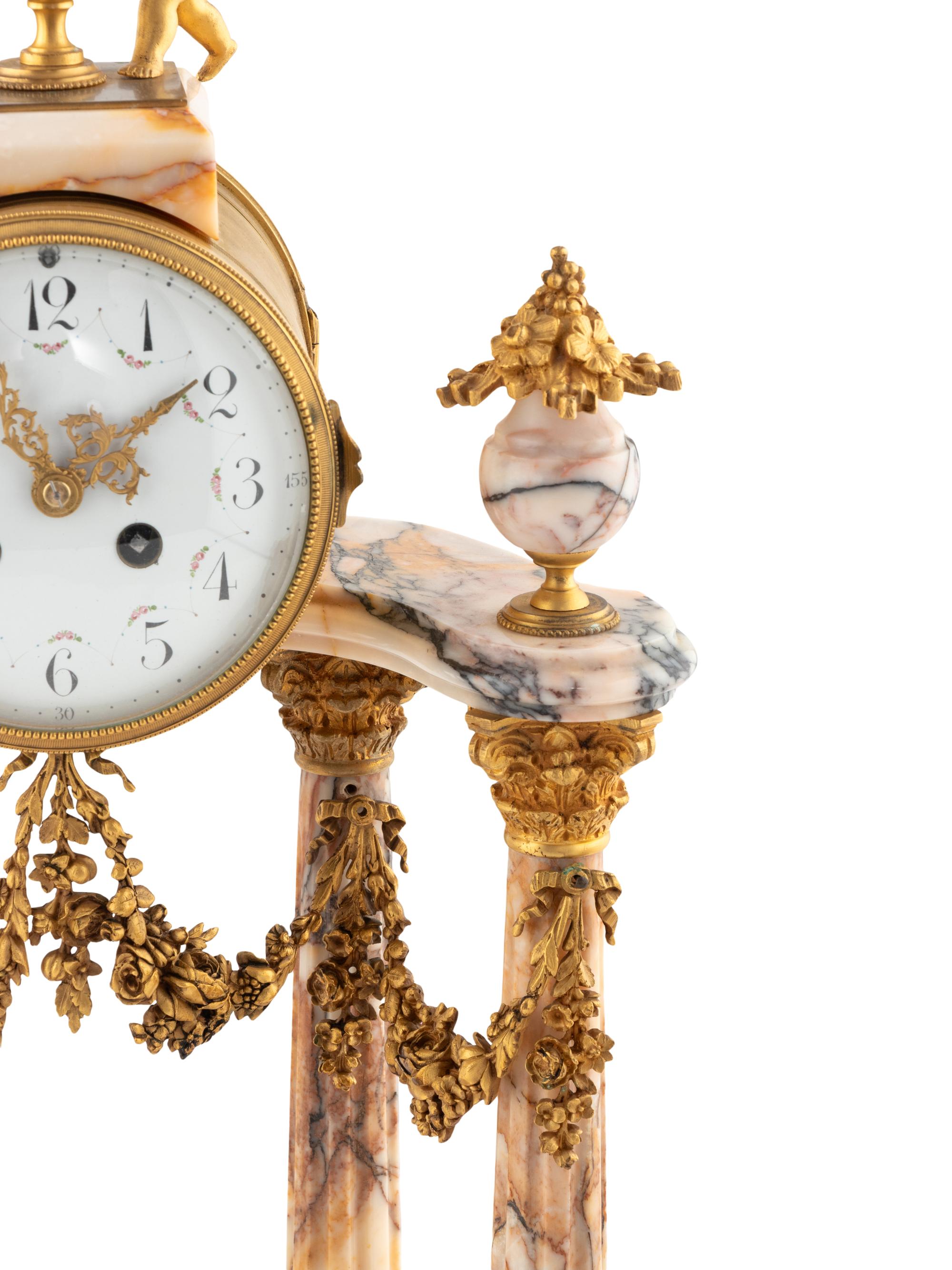 A French Gilt Bronze and Marble Mantel Clock Garniture