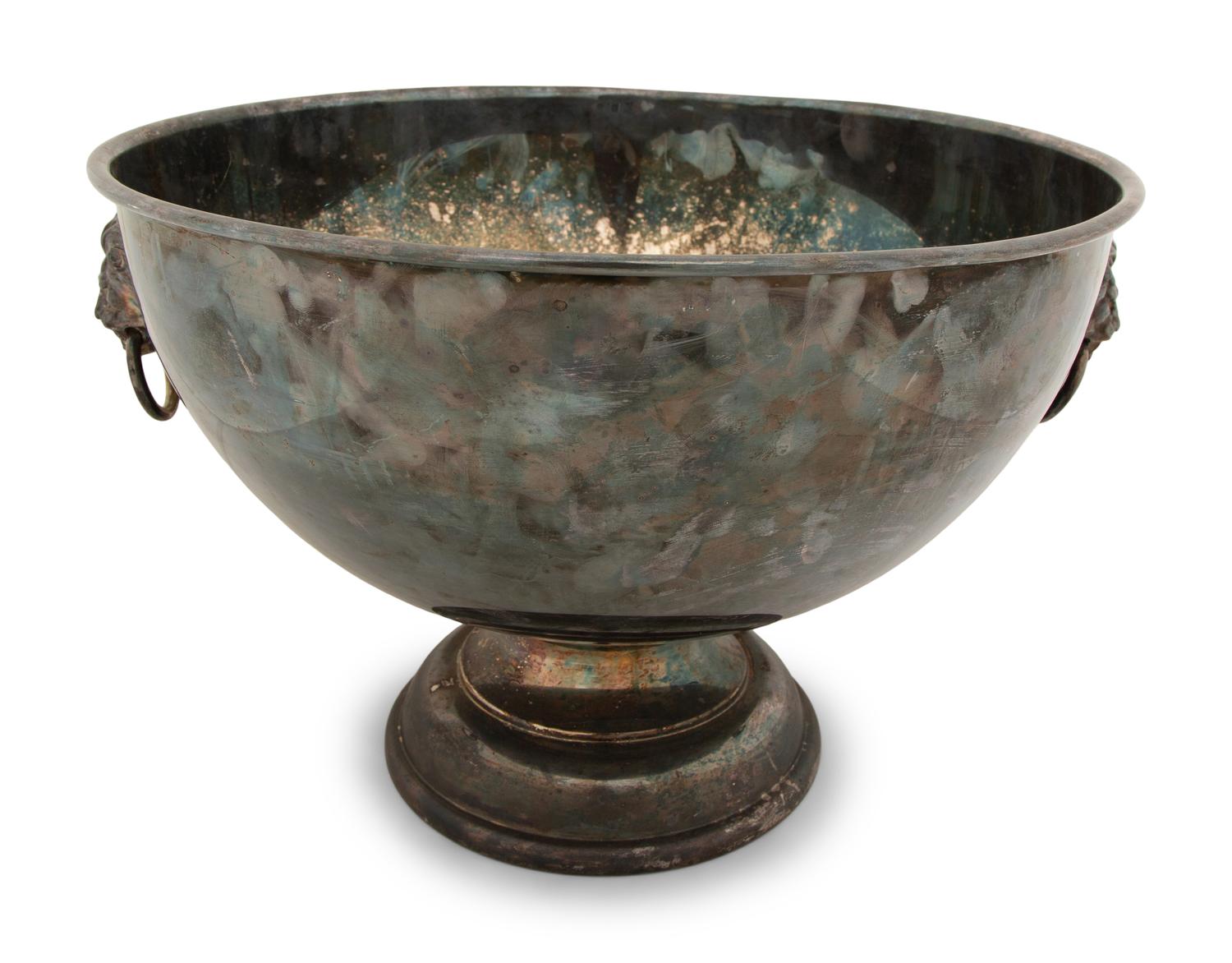 An Assembled Trio of Silverplate Footed Punch Bowls with Lionhead Handles