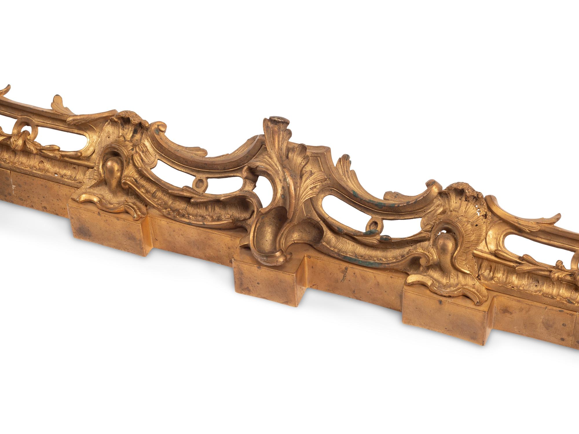 A Gilt and Patinated Bronze Fire Fender with Dog-Form Chenets