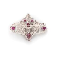 MAUBOUSSIN, ART DECO, CARVED RUBY, DIAMOND, AND BLACK ENAMEL BROOCH