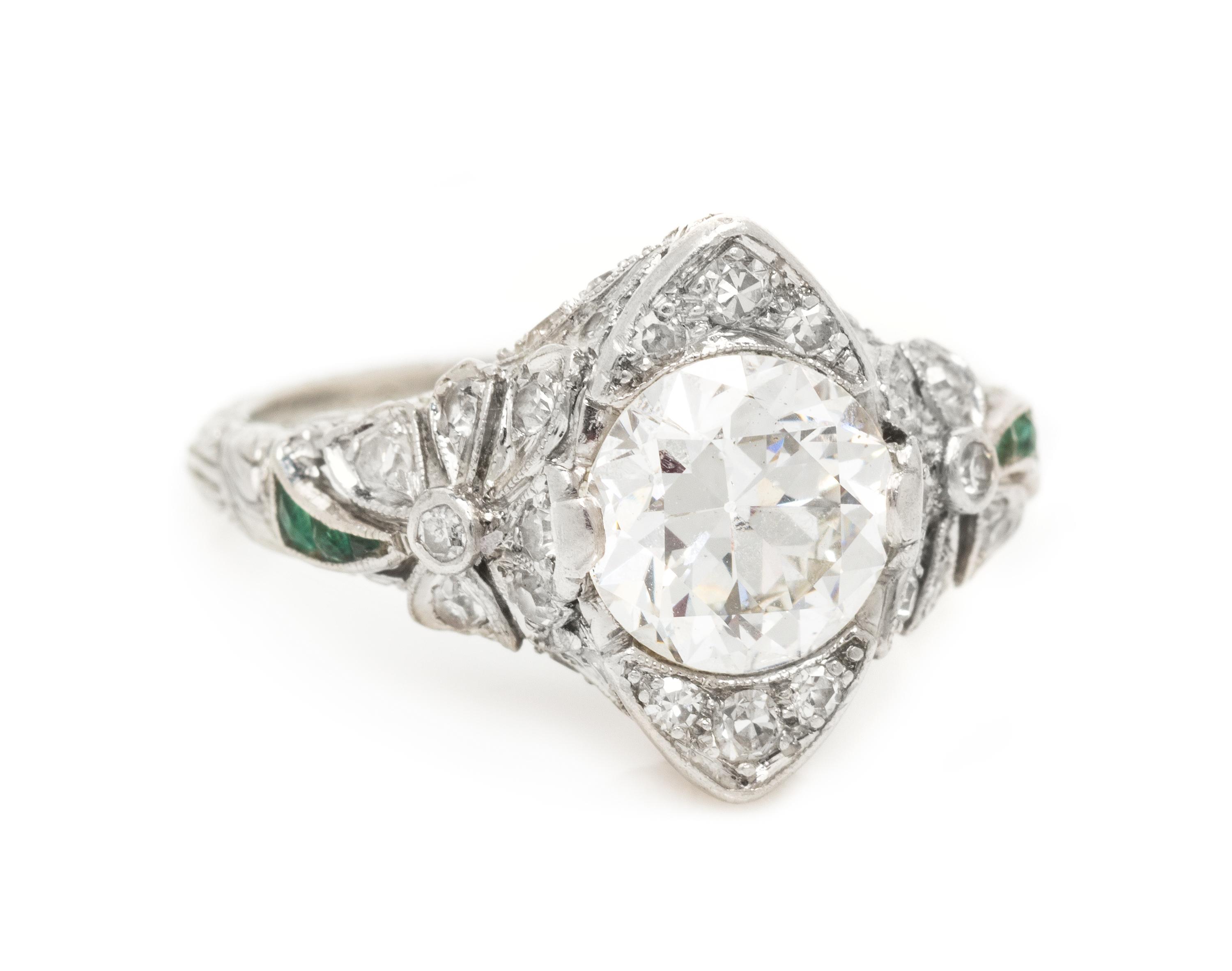 An Edwardian Platinum, Diamond and Emerald Ring, 3.35 dwts.