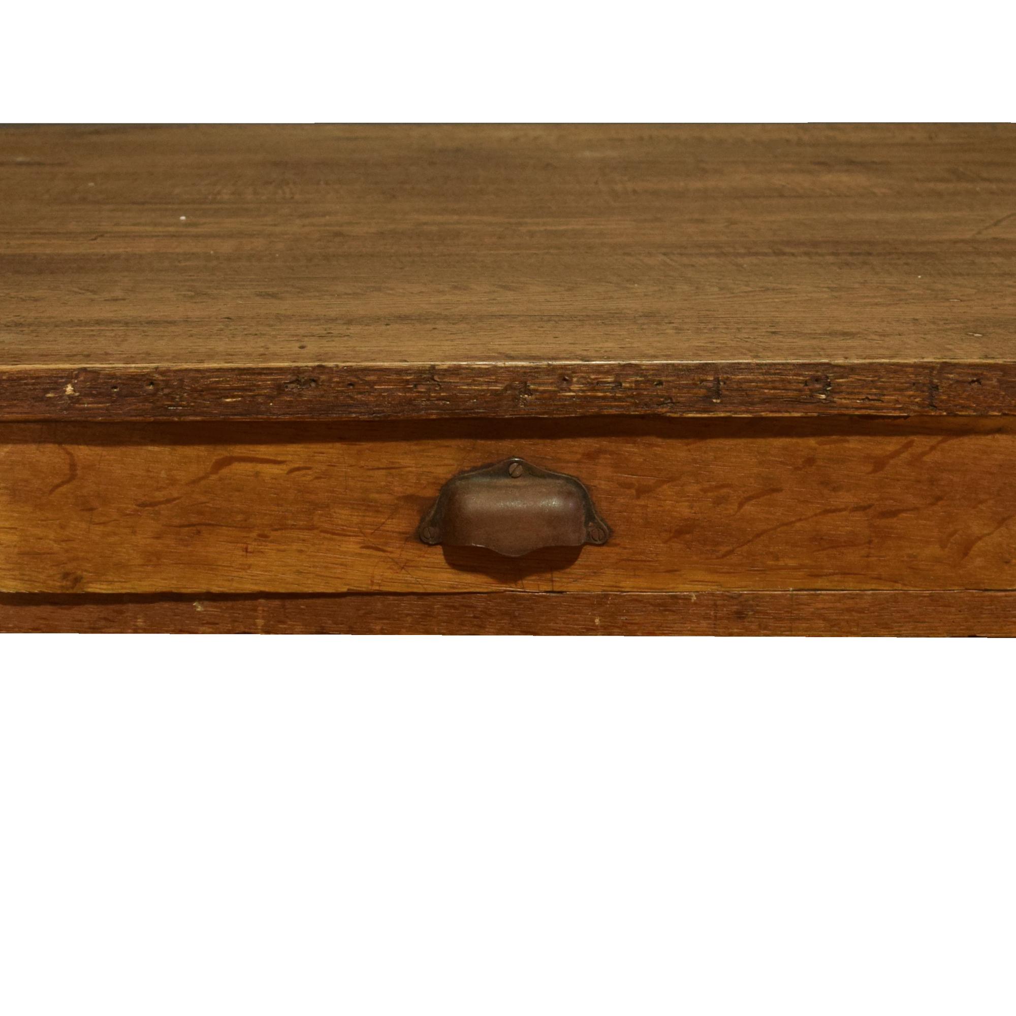 A Four Drawer Oak Table 103.5" x 34.25" D x 29.25" H — France, 19th Century