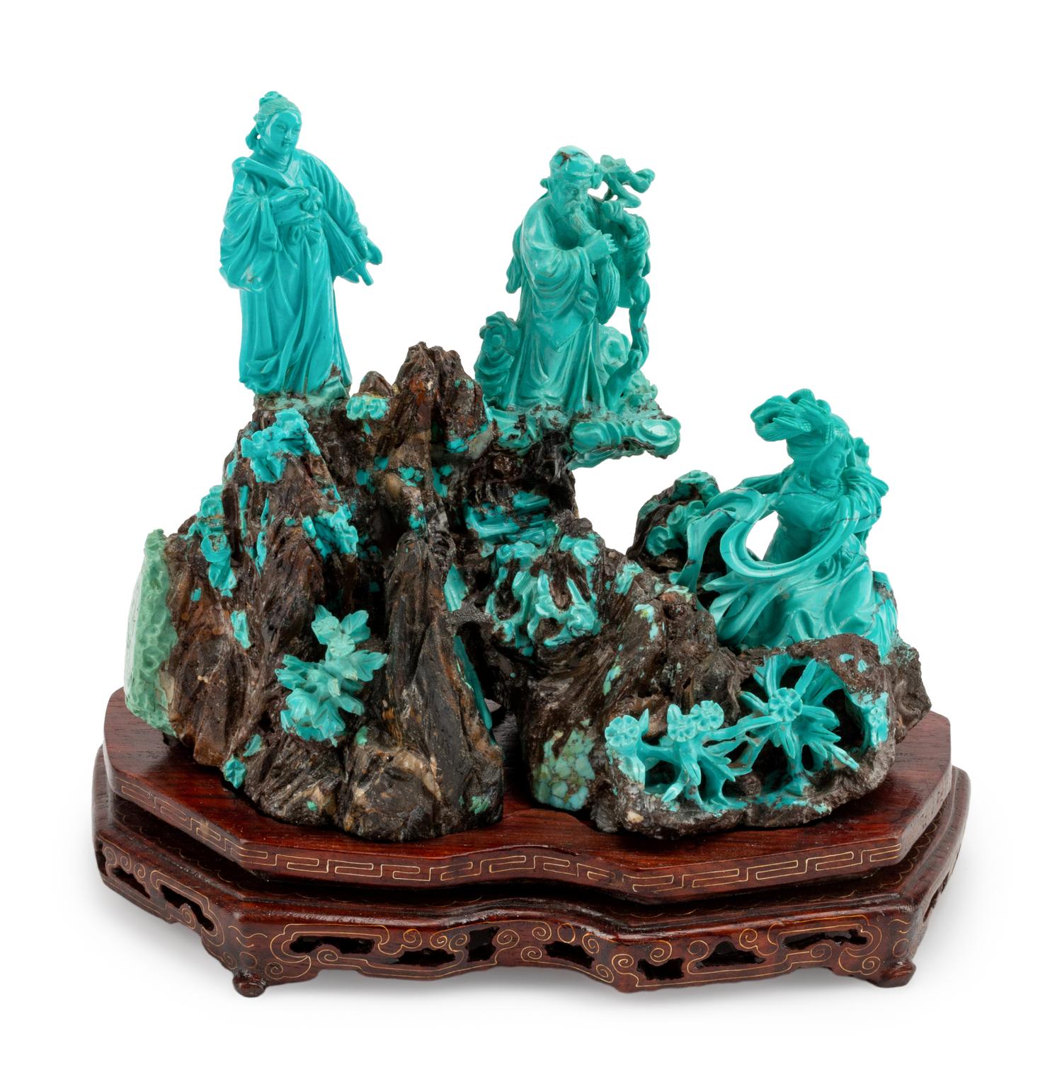 A Chinese Export Carved Turquoise Figural Group