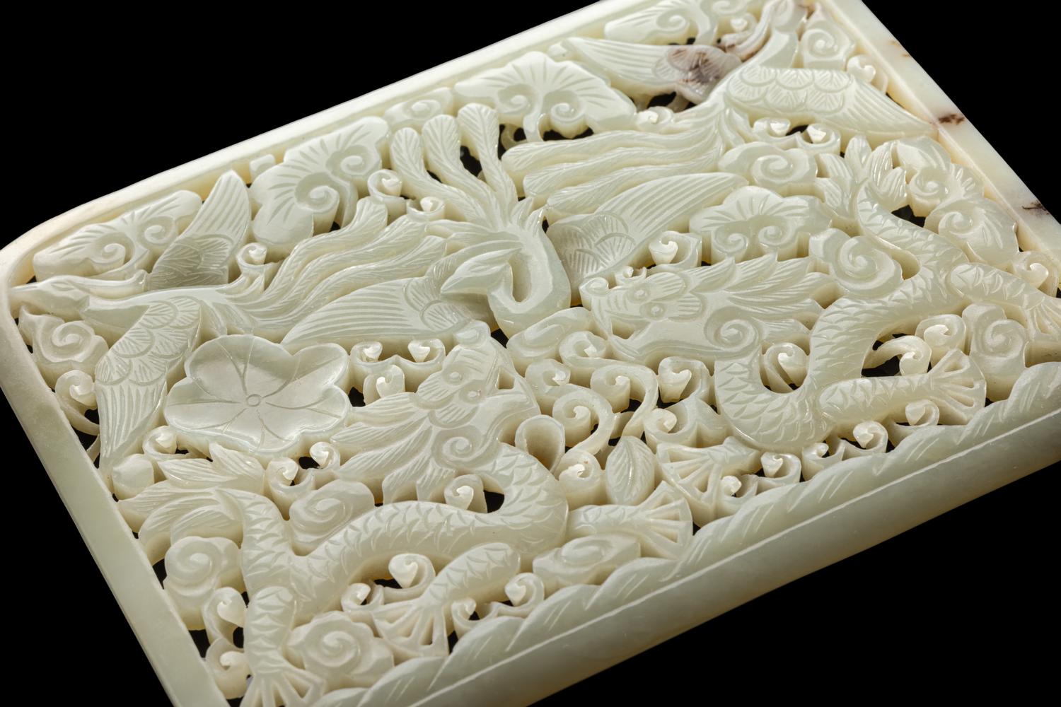 A Chinese Reticulated Jade Plaque and An Archaistic Jade Figure 青玉鏤雕龍鳳紋屏及仿古玉俑