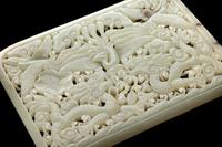 A Chinese Reticulated Jade Plaque and An Archaistic Jade Figure 青玉鏤雕龍鳳紋屏及仿古玉俑