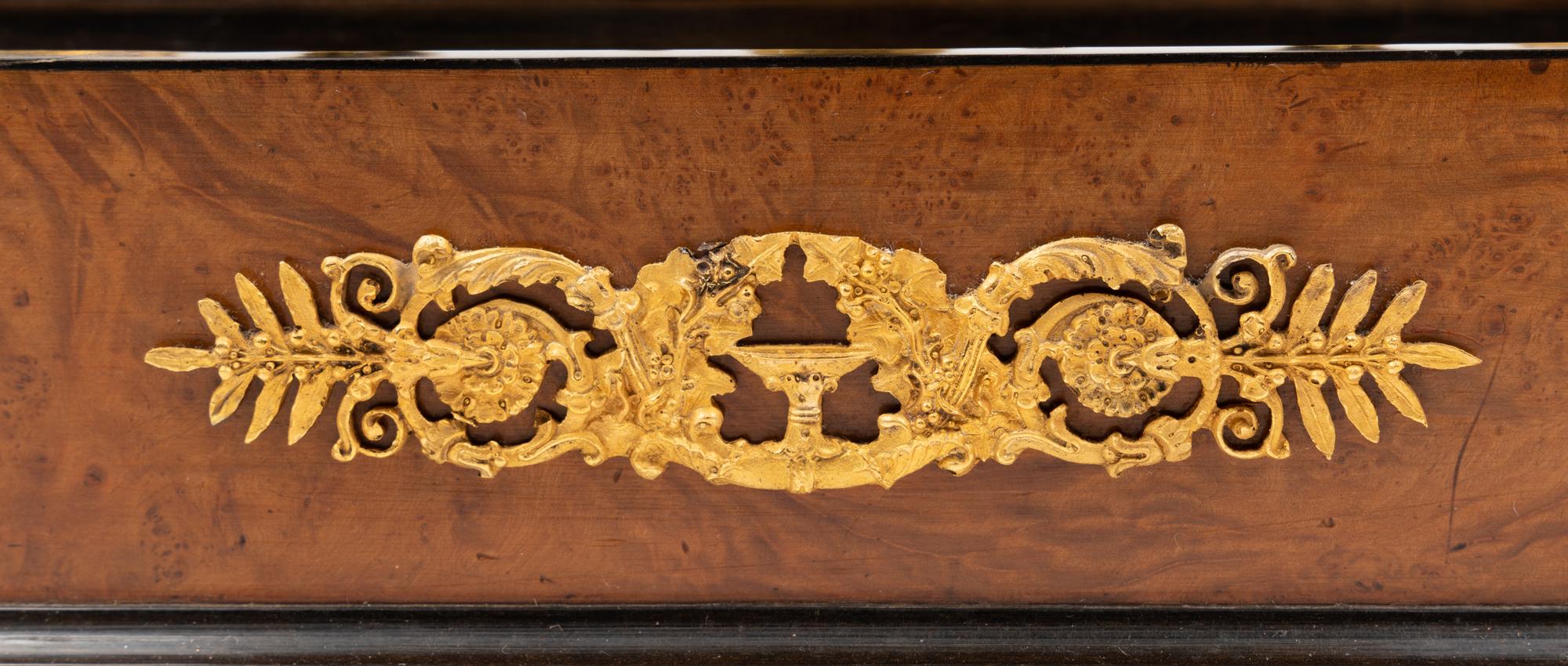 A French Gilt Bronze and Parcel Ebonized Burlwood Encrier