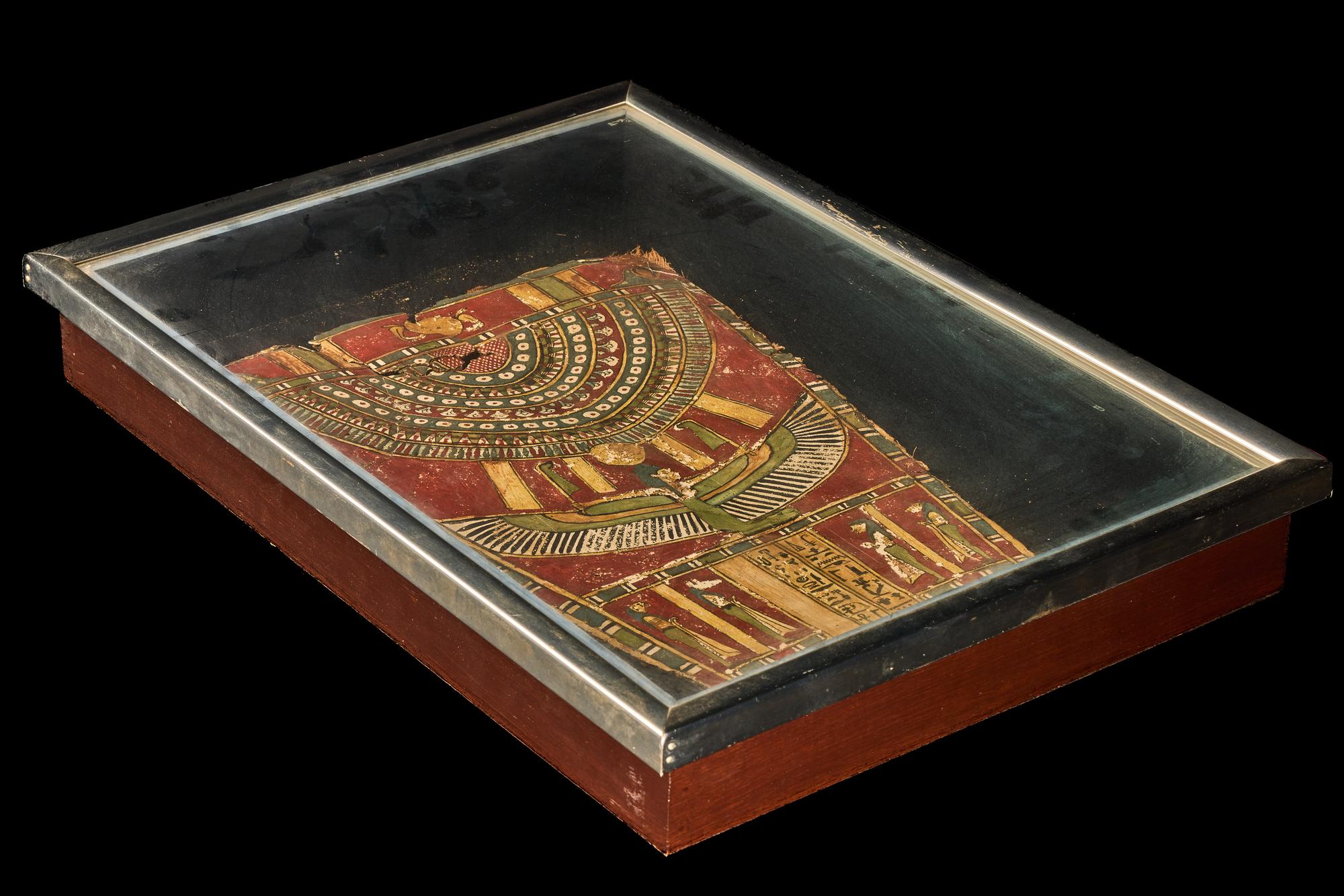 An Egyptian Painted Cartonnage Sarcophagus Fragment