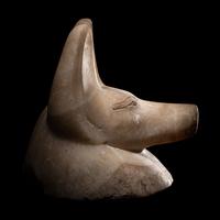 An Egyptian Alabaster Head of a Jackal