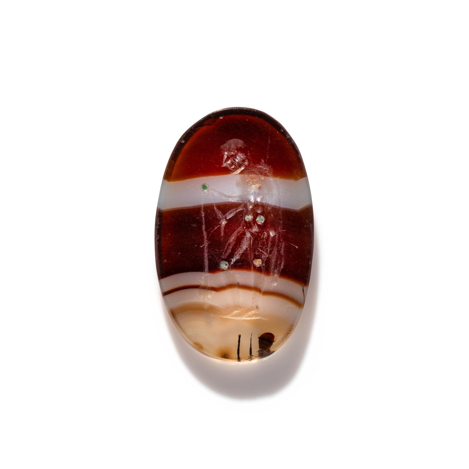 A Roman Banded Agate Ring Stone with a Fisherman and His Catch