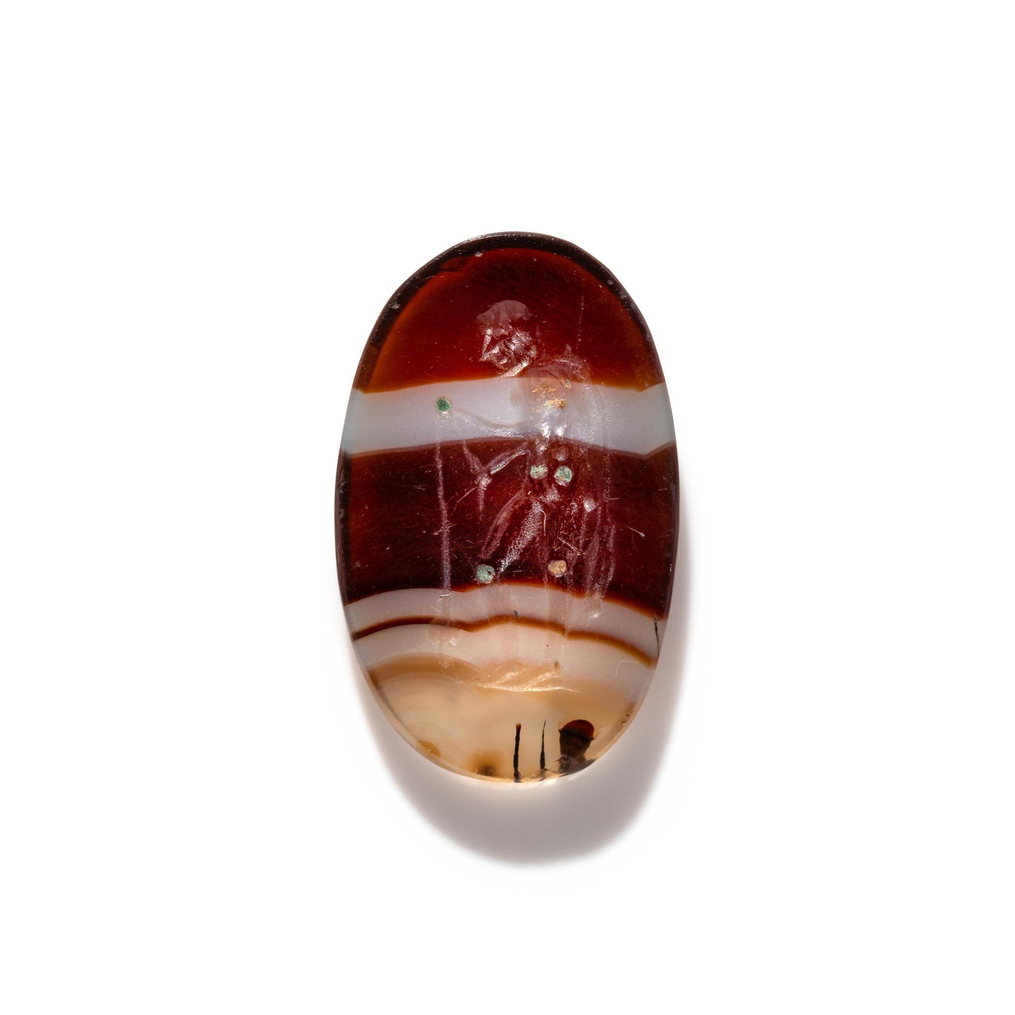 A Roman Banded Agate Ring Stone with a Fisherman and His Catch